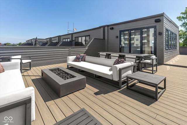 1818 N Pennsylvania St, Indianapolis, IN 46202 - wooden terrace with an outdoor living space with a fire pit