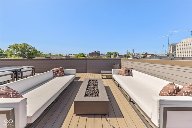 1818 N Pennsylvania St, Indianapolis, IN 46202 - wooden terrace with an outdoor living space with a fire pit