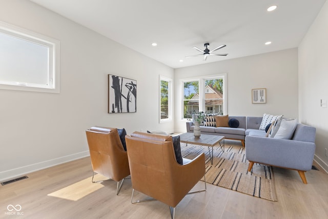 1405 Deloss St, Indianapolis, IN 46201 - living area featuring light wood finished floors, ceiling fan, baseboards, and recessed lighting