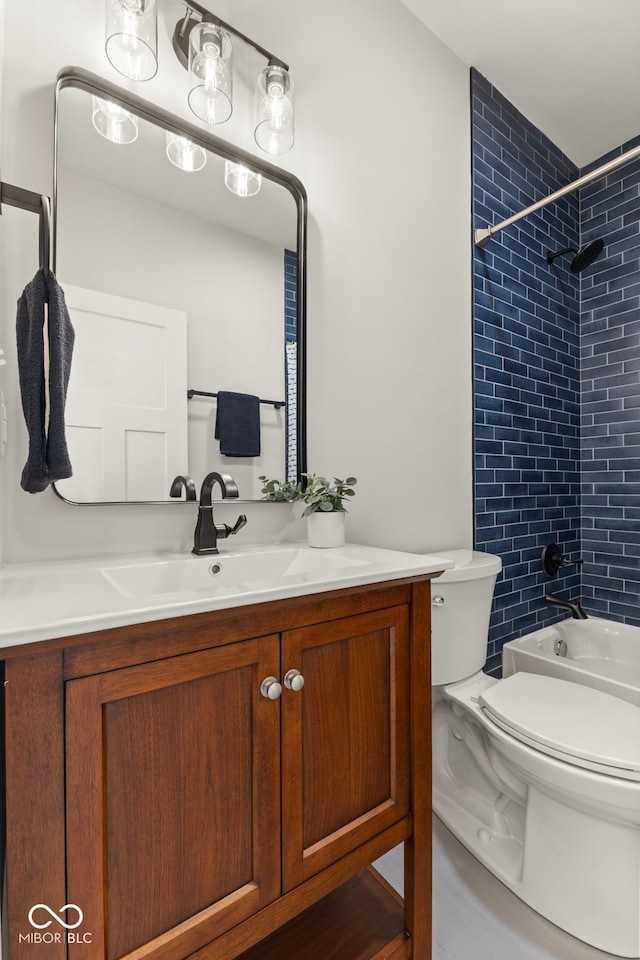 1405 Deloss St, Indianapolis, IN 46201 - bathroom featuring toilet, vanity, and shower / washtub combination