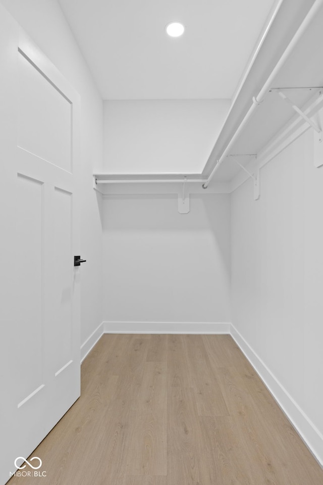 1405 Deloss St, Indianapolis, IN 46201 - walk in closet featuring light wood finished floors