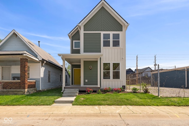 1405 Deloss St, Indianapolis, IN 46201 - view of front of property with a porch and board and batten siding