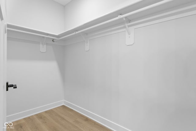 1405 Deloss St, Indianapolis, IN 46201 - walk in closet featuring light wood-type flooring