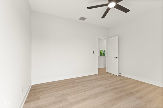 1405 Deloss St, Indianapolis, IN 46201 - spare room featuring a ceiling fan, light wood-style flooring, and baseboards