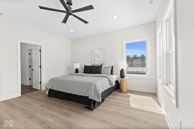 1405 Deloss St, Indianapolis, IN 46201 - bedroom featuring wood finished floors, baseboards, recessed lighting, and ceiling fan