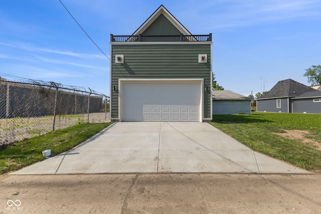 1405 Deloss St, Indianapolis, IN 46201 - view of front of house with driveway and a garage