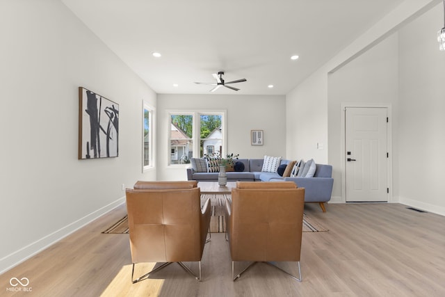 1405 Deloss St, Indianapolis, IN 46201 - living room with light wood-type flooring, a ceiling fan, baseboards, and recessed lighting