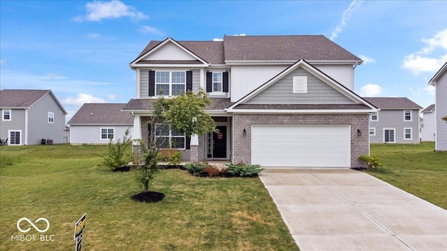 6507 W Whispering Way, Greenfield, IN 46140 - craftsman inspired home featuring brick siding, driveway, and a front lawn