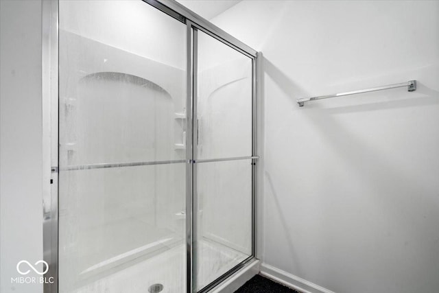 6507 W Whispering Way, Greenfield, IN 46140 - bathroom with a shower stall and baseboards