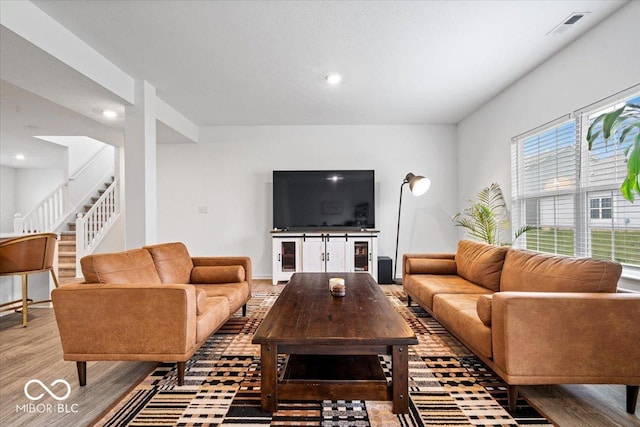 6507 W Whispering Way, Greenfield, IN 46140 - living area with stairway, wood finished floors, and recessed lighting