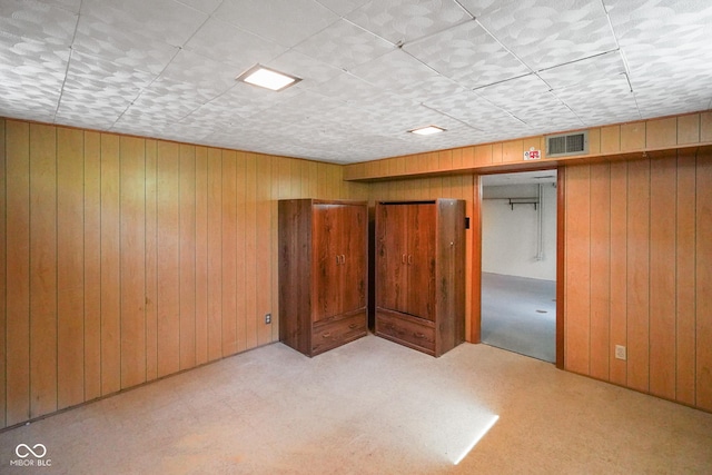 6133 Ashway Ct, Indianapolis, IN 46224 - finished basement featuring wooden walls and carpet flooring