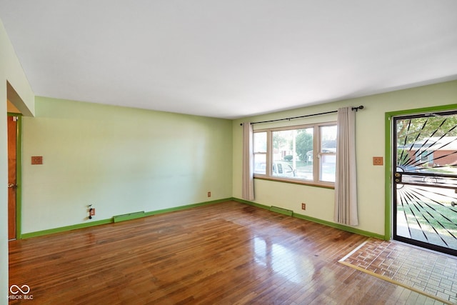 6133 Ashway Ct, Indianapolis, IN 46224 - entryway with hardwood / wood-style flooring and baseboards