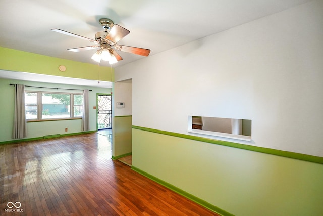 6133 Ashway Ct, Indianapolis, IN 46224 - unfurnished room featuring a ceiling fan and hardwood / wood-style floors