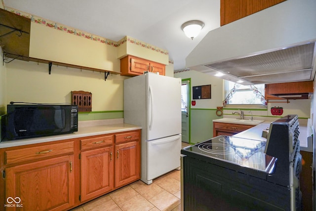6133 Ashway Ct, Indianapolis, IN 46224 - kitchen with black appliances, wall chimney exhaust hood, light countertops, light tile patterned floors, and brown cabinetry