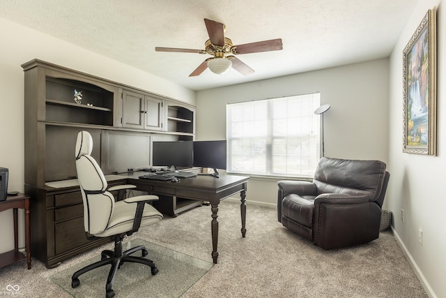 2096 Whitetail Ct, Avon, IN 46123 - home office featuring light carpet, ceiling fan, baseboards, and a textured ceiling