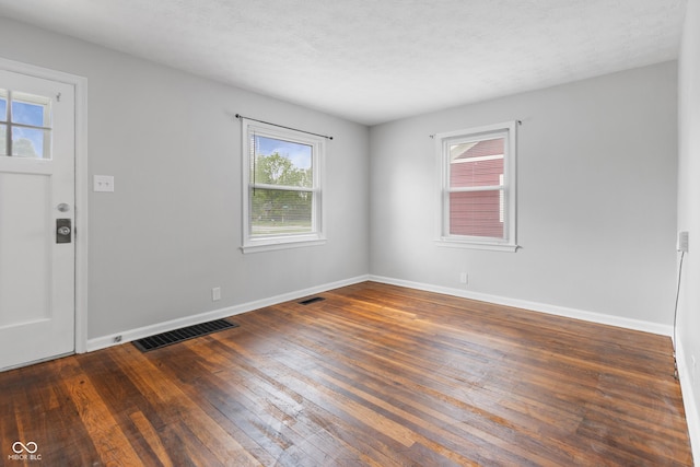 2164 E Raymond St, Indianapolis, IN 46203 - empty room with hardwood / wood-style flooring and baseboards