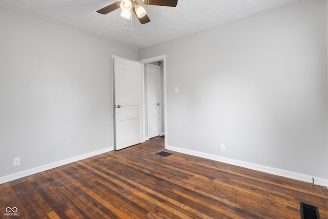 2164 E Raymond St, Indianapolis, IN 46203 - empty room with a ceiling fan, baseboards, and wood finished floors