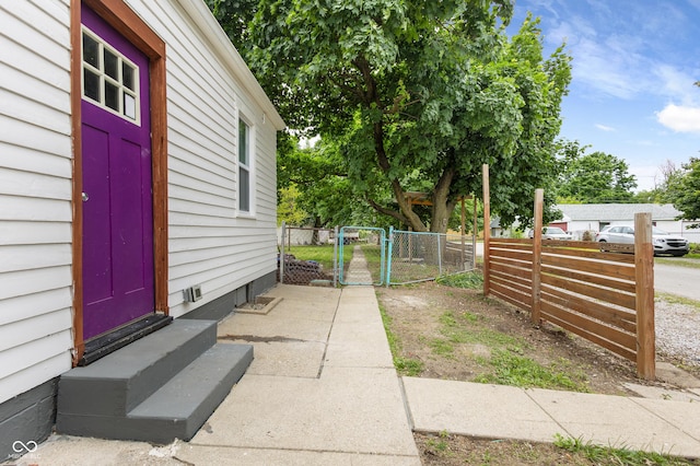 2164 E Raymond St, Indianapolis, IN 46203 - view of yard featuring entry steps and a gate