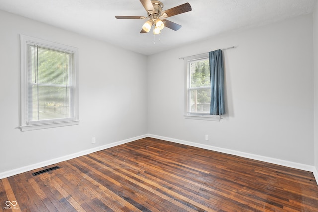 2164 E Raymond St, Indianapolis, IN 46203 - empty room with hardwood / wood-style flooring and baseboards
