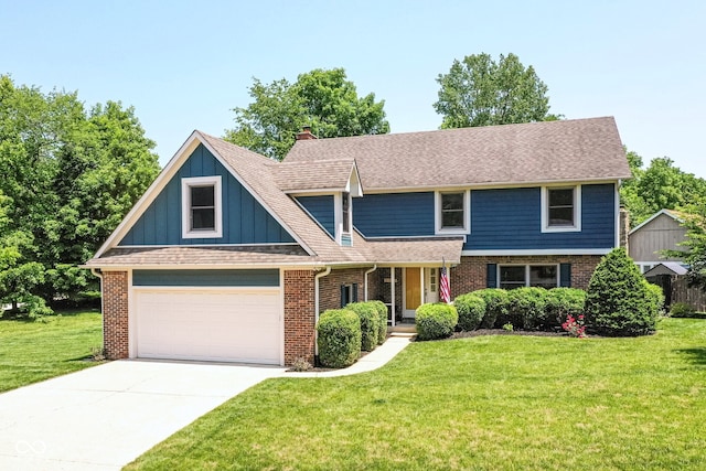 6580 Kings Ct, Avon, IN 46123 - view of front facade with a front lawn, concrete driveway, brick siding, and roof with shingles