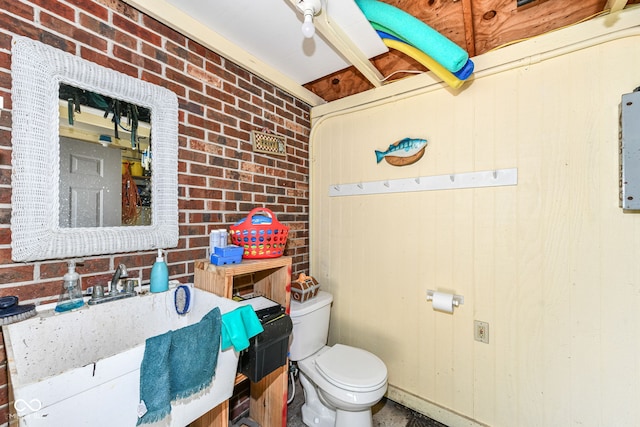 6580 Kings Ct, Avon, IN 46123 - half bath featuring vanity and brick wall