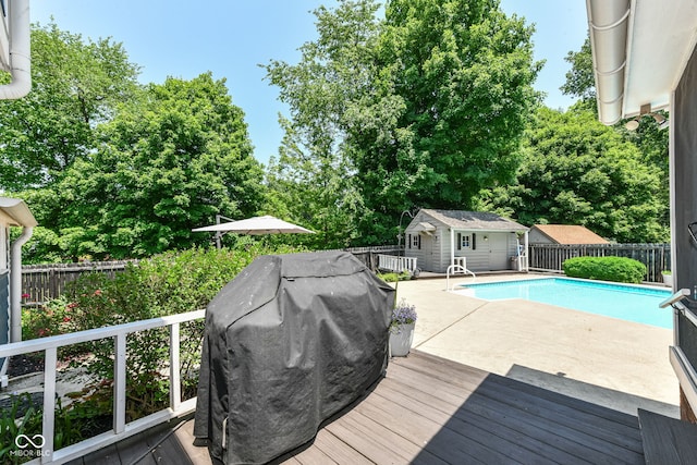 6580 Kings Ct, Avon, IN 46123 - view of pool with a fenced backyard, a deck, an outbuilding, and view of scattered trees
