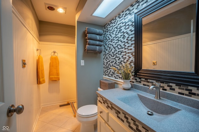 131 Olde Mill Bay, Indianapolis, IN 46260 - bathroom with tile patterned flooring, toilet, backsplash, vanity, and baseboards