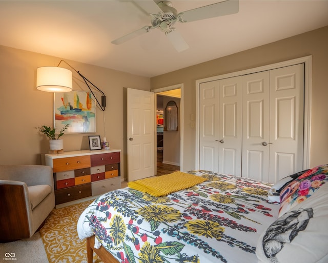 131 Olde Mill Bay, Indianapolis, IN 46260 - bedroom featuring a closet, light colored carpet, and a ceiling fan