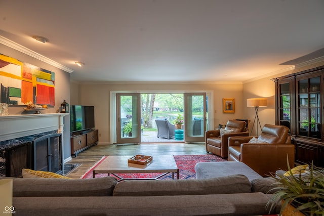 131 Olde Mill Bay, Indianapolis, IN 46260 - living room with a high end fireplace, crown molding, wood finished floors, and baseboards