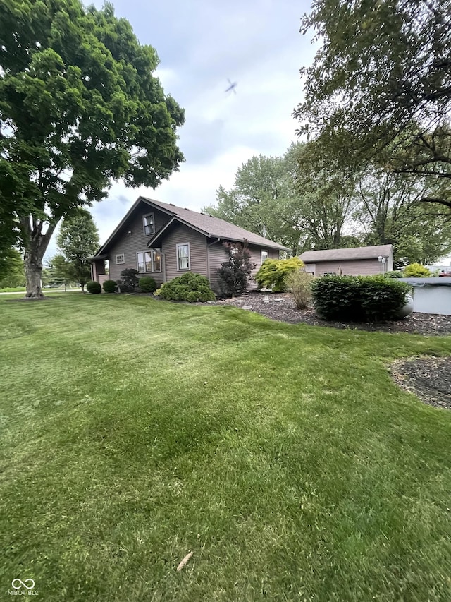 9467 N Michigan Rd, Fairland, IN 46126 - view of property exterior with a yard