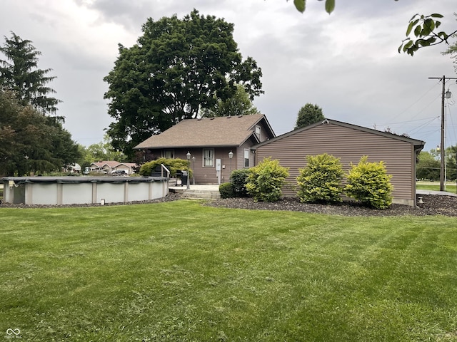 9467 N Michigan Rd, Fairland, IN 46126 - view of grassy yard featuring a covered pool