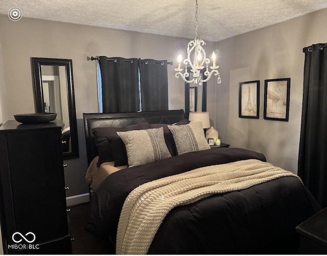 9467 N Michigan Rd, Fairland, IN 46126 - bedroom with a chandelier and a textured ceiling