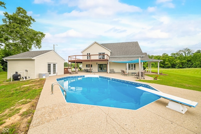 5439 E Kinderhook Rd, Scottsburg, IN 47170 - outdoor pool featuring french doors, a lawn, a patio, a diving board, and outdoor dining area