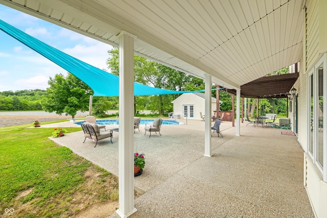5439 E Kinderhook Rd, Scottsburg, IN 47170 - view of patio with an outdoor structure, an outdoor pool, and a storage structure