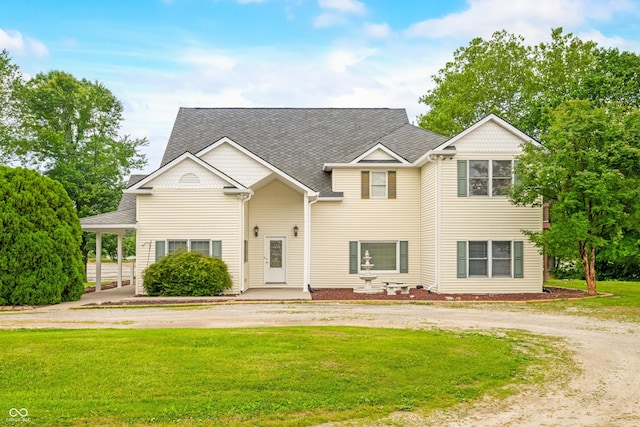 5439 E Kinderhook Rd, Scottsburg, IN 47170 - view of front facade with a front yard, a shingled roof, and curved driveway