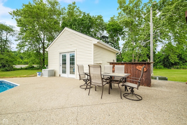 5439 E Kinderhook Rd, Scottsburg, IN 47170 - view of patio featuring outdoor dining space and an outdoor pool