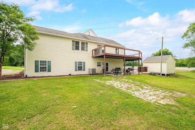 5439 E Kinderhook Rd, Scottsburg, IN 47170 - rear view of property with a lawn, a patio, an outdoor structure, and central AC