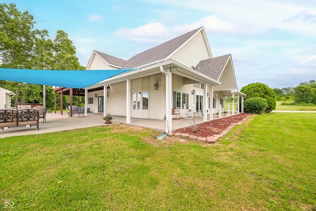 5439 E Kinderhook Rd, Scottsburg, IN 47170 - view of property exterior featuring a lawn, a patio area, and outdoor lounge area