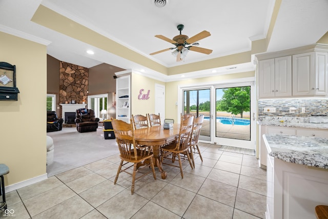 5439 E Kinderhook Rd, Scottsburg, IN 47170 - dining room with crown molding, a ceiling fan, light tile patterned flooring, a raised ceiling, and recessed lighting
