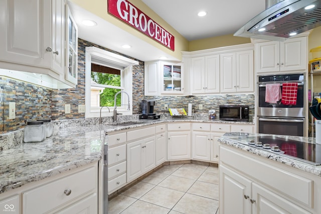 5439 E Kinderhook Rd, Scottsburg, IN 47170 - kitchen with a sink, exhaust hood, black appliances, decorative backsplash, and recessed lighting