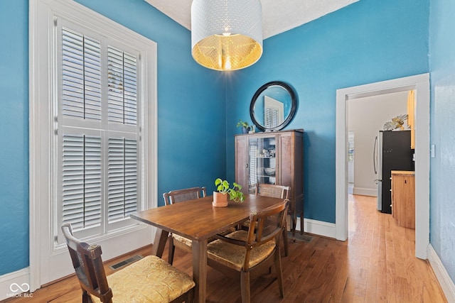 245 S Washington St, Danville, IN 46122 - dining area with wood finished floors and baseboards