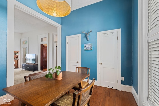 245 S Washington St, Danville, IN 46122 - dining room with baseboards and wood finished floors