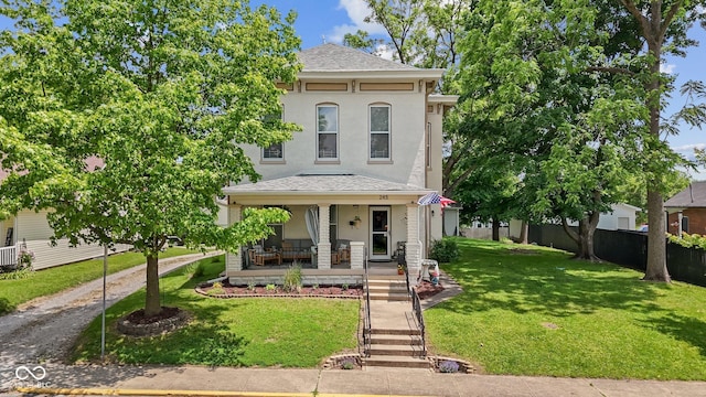 245 S Washington St, Danville, IN 46122 - italianate house with covered porch, stucco siding, and roof with shingles