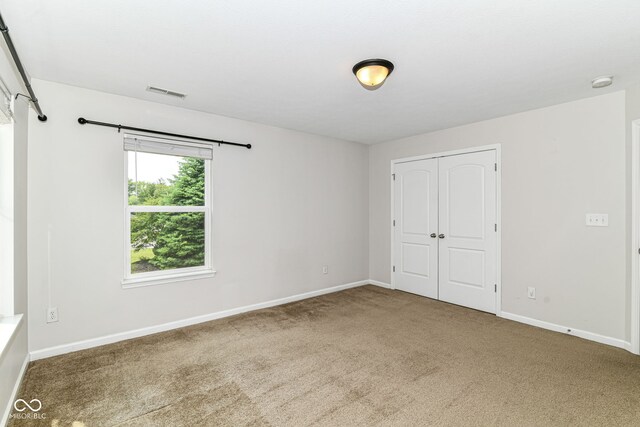4650 Blue Marlin Way, Indianapolis, IN 46239 - unfurnished bedroom with carpet and a closet