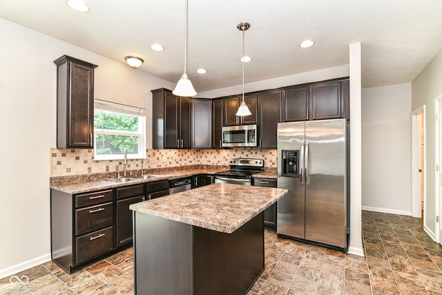 4650 Blue Marlin Way, Indianapolis, IN 46239 - kitchen with appliances with stainless steel finishes, dark brown cabinetry, backsplash, decorative light fixtures, and recessed lighting
