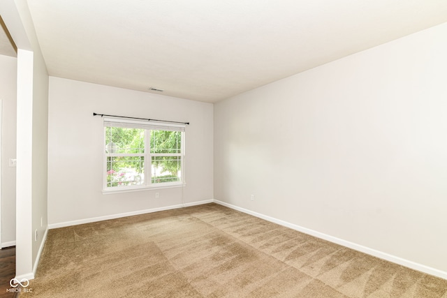 4650 Blue Marlin Way, Indianapolis, IN 46239 - empty room with baseboards and carpet floors
