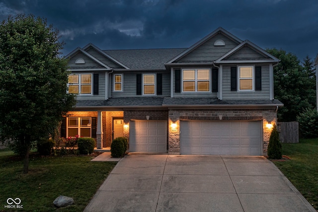 4650 Blue Marlin Way, Indianapolis, IN 46239 - view of front facade with concrete driveway, a garage, brick siding, and a shingled roof