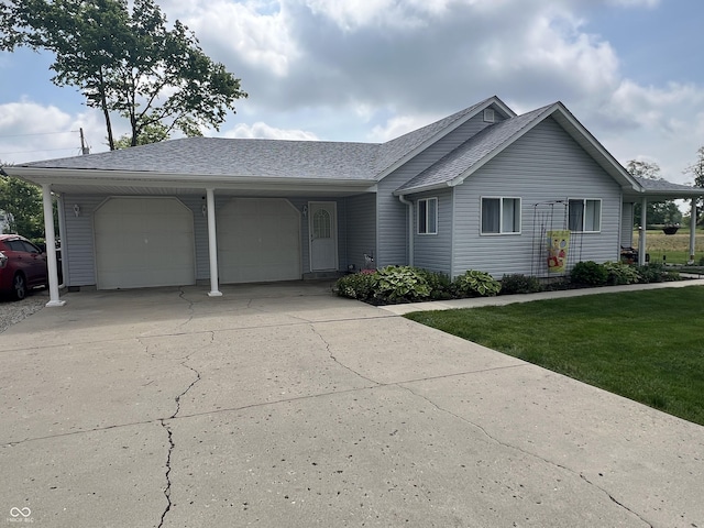 542 S Greensboro Pike, New Castle, IN 47362 - single story home with a garage, concrete driveway, a front lawn, and a shingled roof