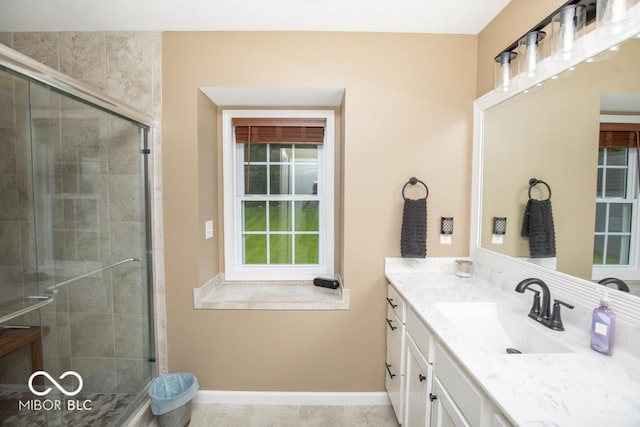 845 S Bay, North Vernon, IN 47265 - bathroom featuring vanity, a stall shower, and baseboards