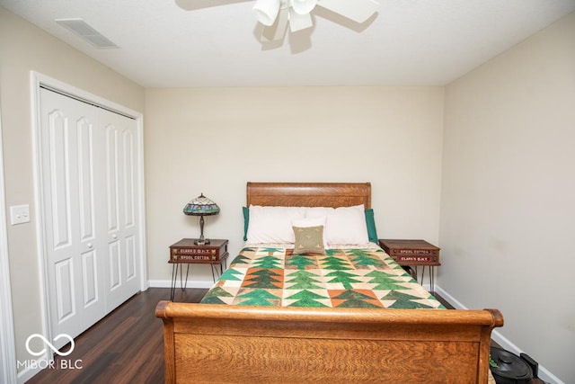 845 S Bay, North Vernon, IN 47265 - bedroom with dark wood-type flooring, baseboards, a closet, and ceiling fan